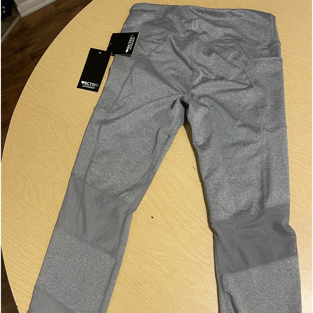 Brand new pair of grey size S leggings. Perfect fit for ages 11-15